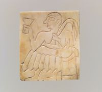 Cult vessel in the form of a tower with cylinder seal impressions near the top