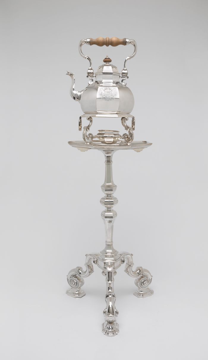 Teakettle, lamp, and table
