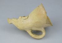 Terracotta fragment of a kylix (drinking cup)