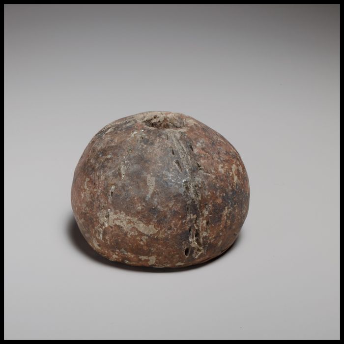 Spherical spindle-whorl with flat base