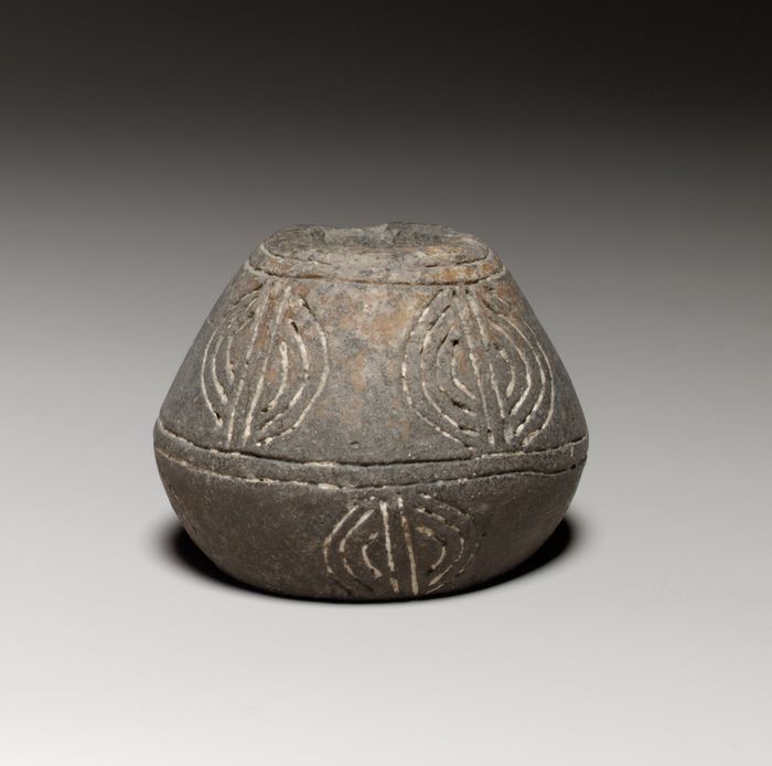 Terracotta biconical spindle-whorl
