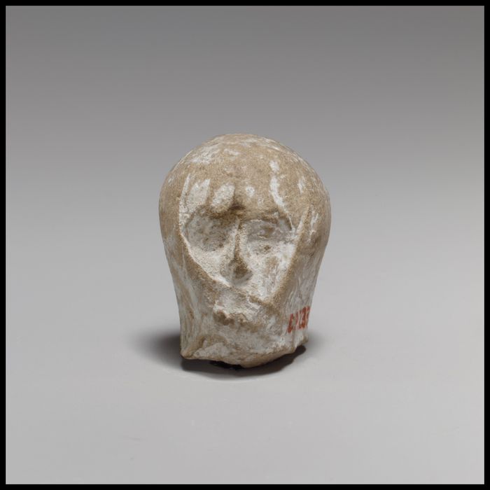 Terracotta head of a veiled woman