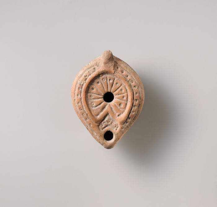 Terracotta oil lamp