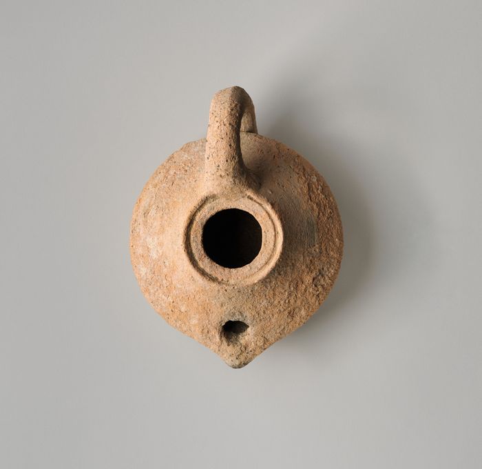 Terracotta oil lamp