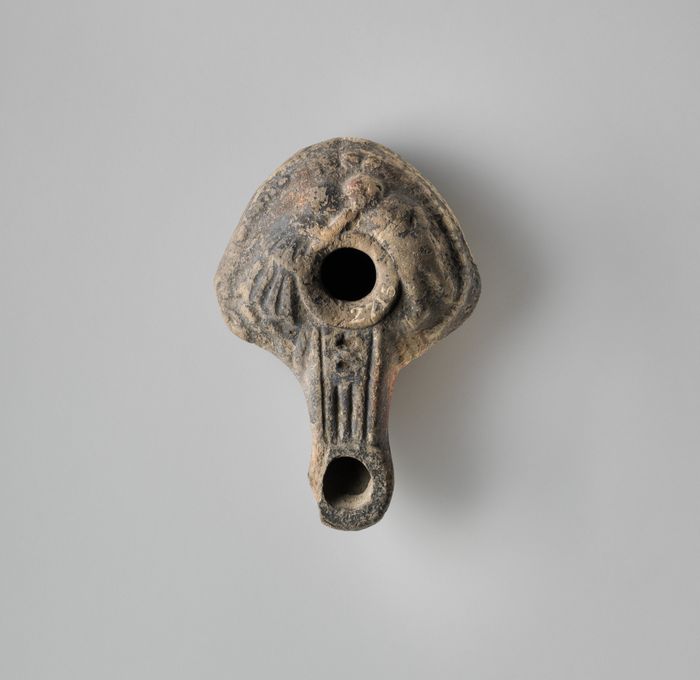 Terracotta oil lamp