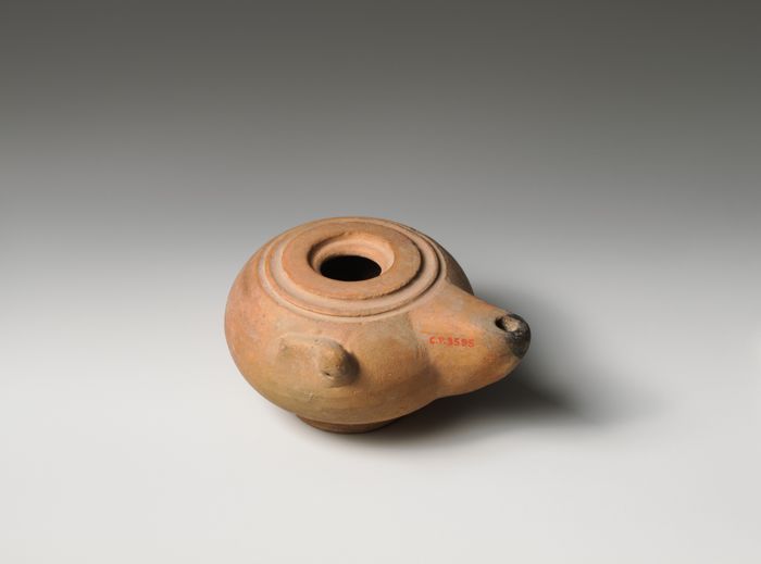 Terracotta oil lamp