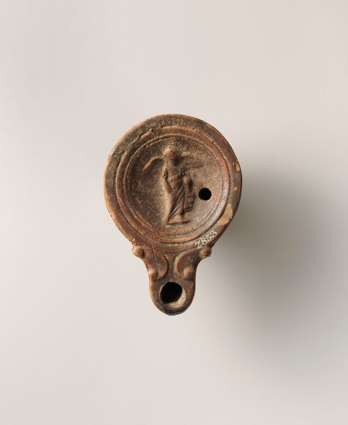 Terracotta oil lamp