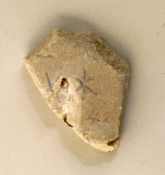 Limestone inscribed box fragment