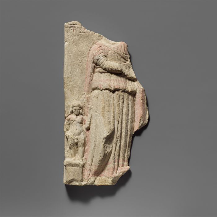 Limestone votive relief fragment