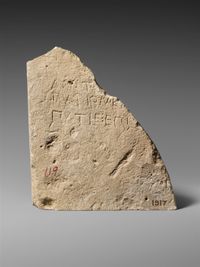 Inscribed limestone base