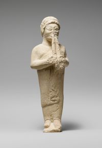 Terracotta bowl on a high stand