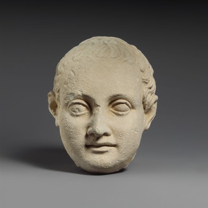 Limestone head of a boy