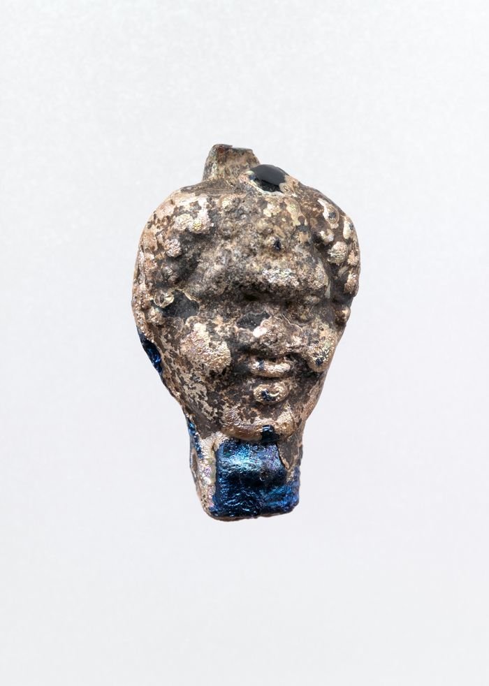 Glass pendant in the shape of a Black African's head