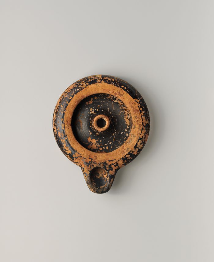 Terracotta oil lamp