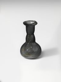 Glass jug in the shape of a bunch of grapes