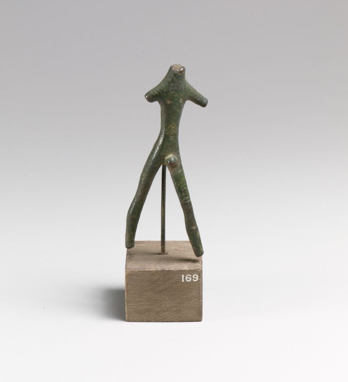 Statuette of a striding man