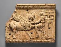 Haematite intaglio: Youth on inscribed stele