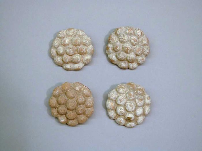 Four terracotta disks