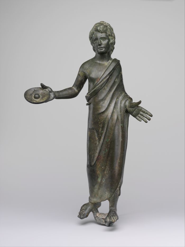 Bronze statuette of a priest