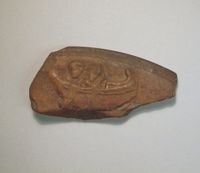 Terracotta fragment of a kylix (drinking cup)