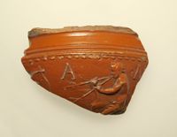 Terracotta rim fragment of a kylix (drinking cup)