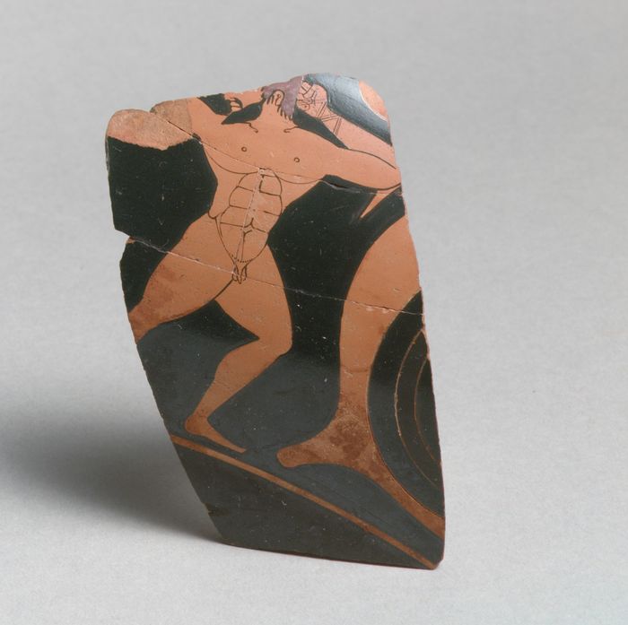 Fragment of a terracotta kylix: eye-cup (drinking cup)