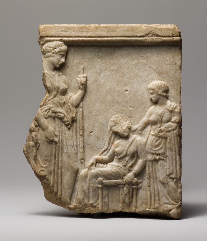 Marble votive relief fragment of goddesses, mother, nurse, and infant