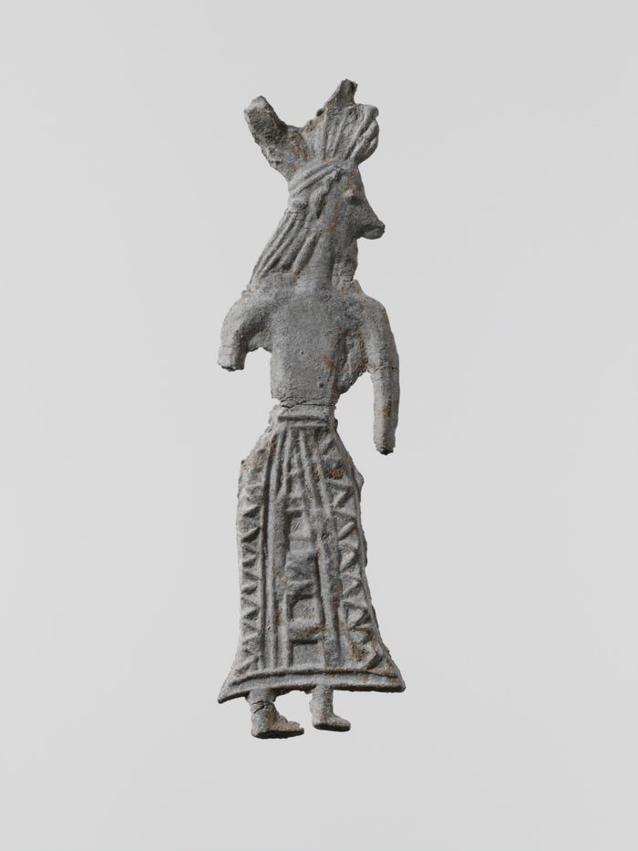 Lead figure of a woman with wreath