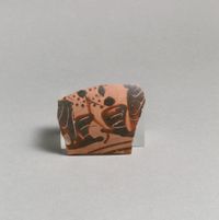 Limestone head of beardless male votary