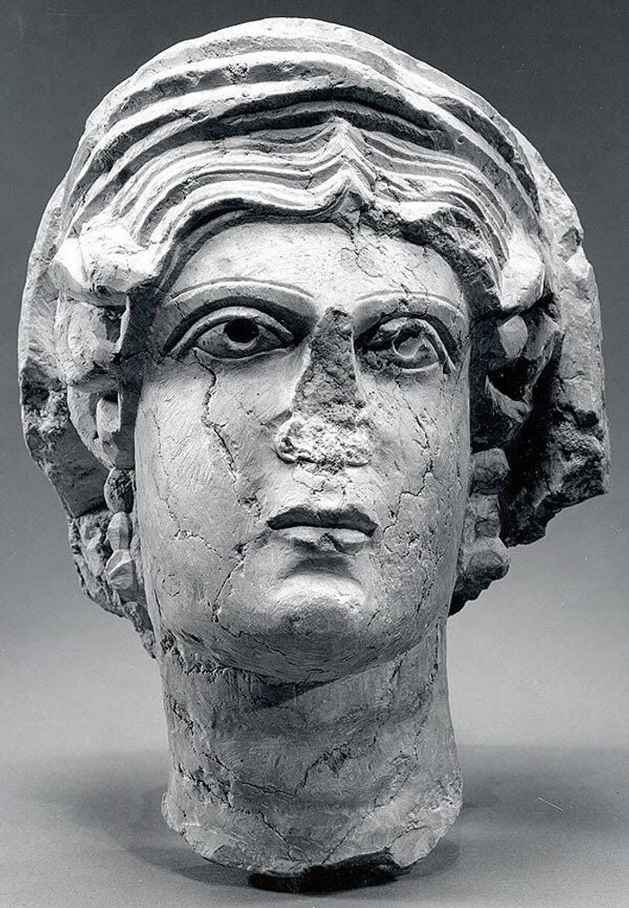 Marble female head from a relief