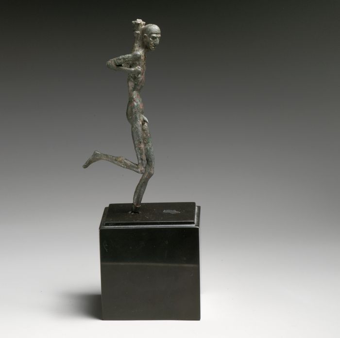 Bronze statuette of a runner