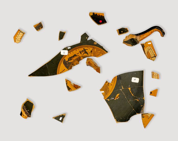 Fragments of a terracotta kylix (drinking cup)