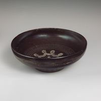 Terracotta rim fragment of a kylix (drinking cup)