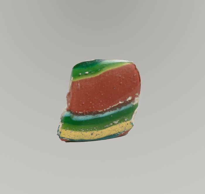 Glass striped mosaic bowl fragment