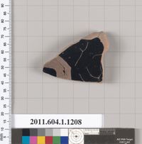 Seated limestone kourotrophos