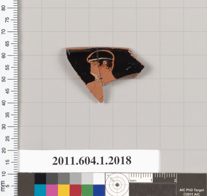 Terracotta rim fragment of a kylix (drinking cup)