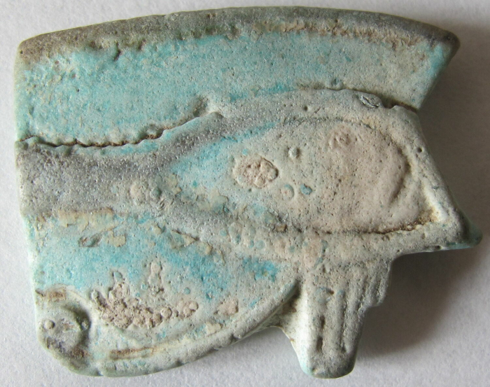 simple single-sided udjat amulet; udjat amulet with smooth convex back