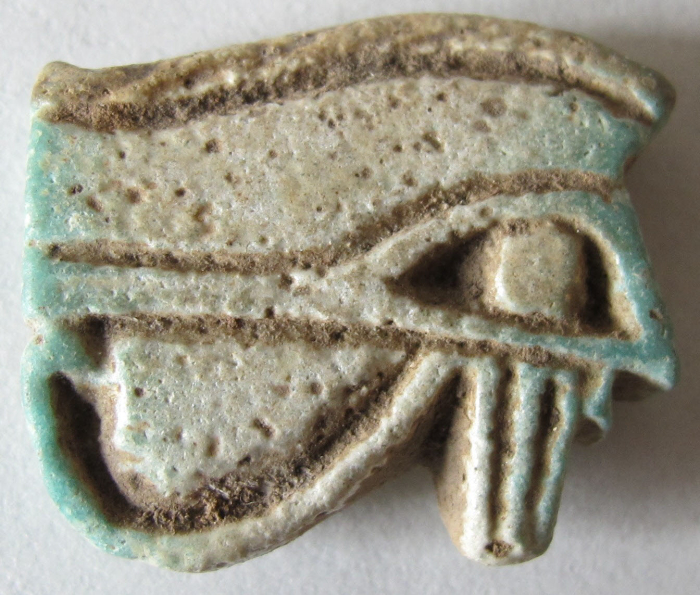 simple single-sided udjat amulet; udjat amulet with smooth convex back