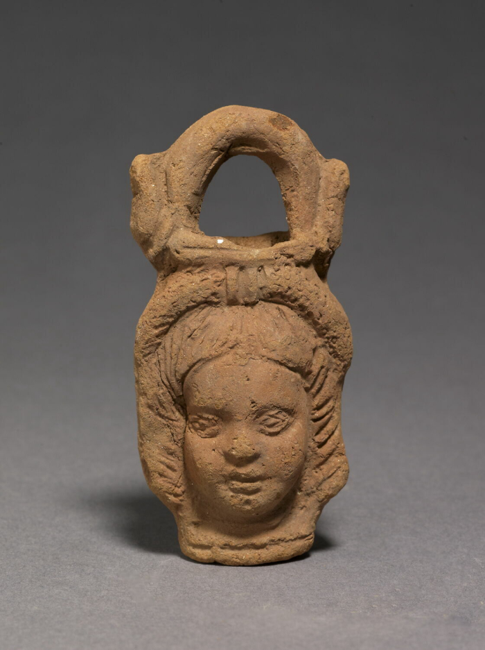 figurine; plastic vase; situla