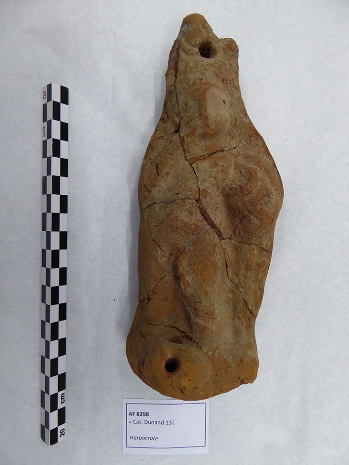 figurine of Harpocrates in the pot; lamp