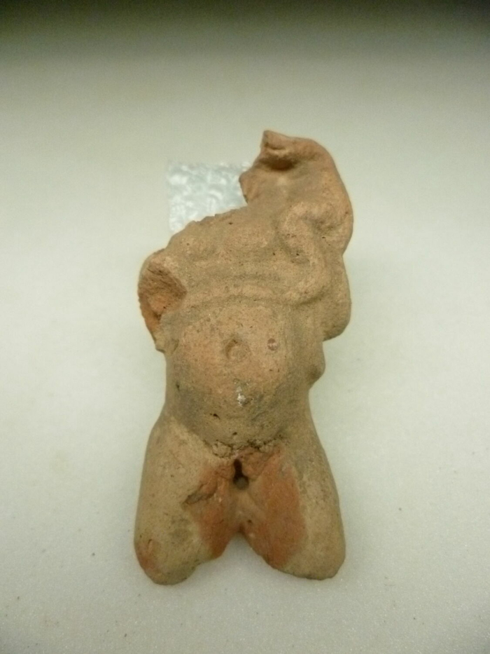 figurine of Harpocrates carrying his image
