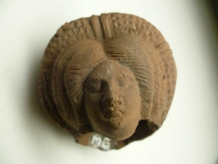 figurine of a praying woman