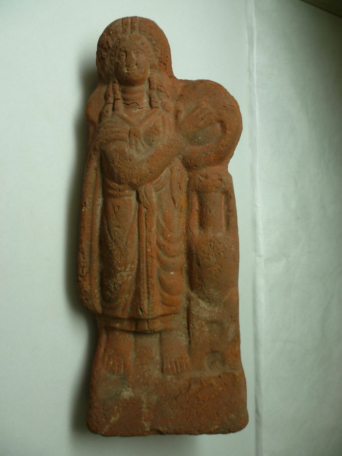figurine of a woman with a tambourine