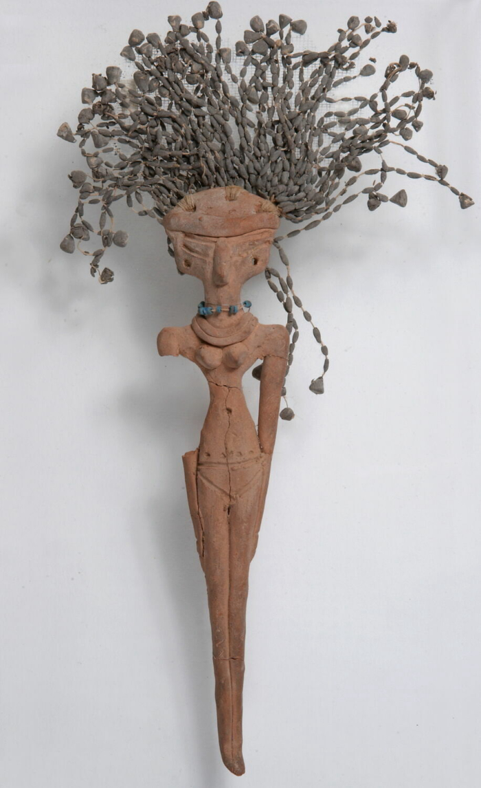 female figurine; pearl