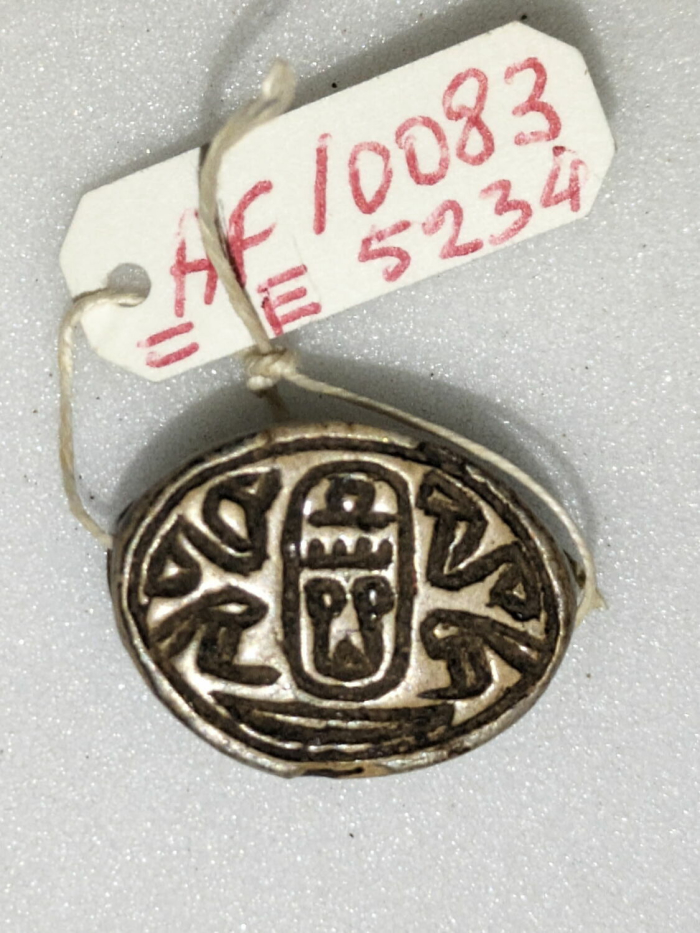 cauroid pearl with cord and stops