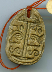 ring with axis with rolled ends; ring with movable bezel; ring with circled bezel; scarab