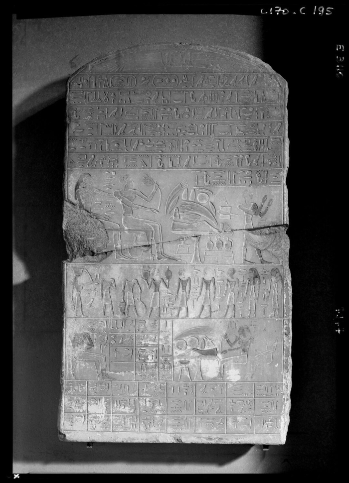 curved stele; three-register stele